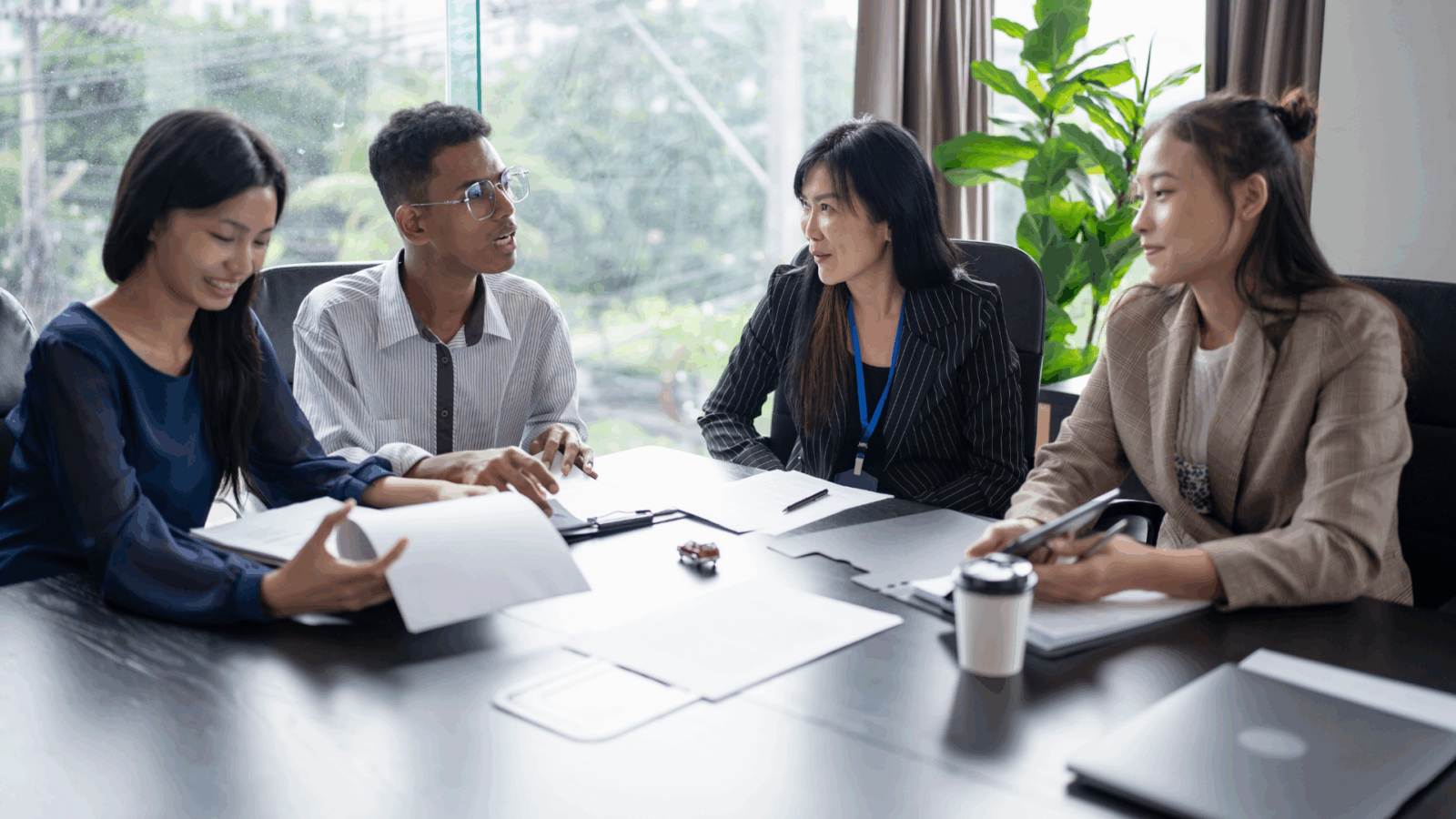 An image of two small business owners who recently met with their business consulting team to discuss ownership of their growing operation.